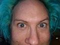 Wild-eyed blue-haired freak